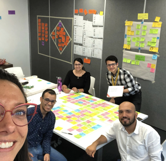 EY design studio staff in a conference room